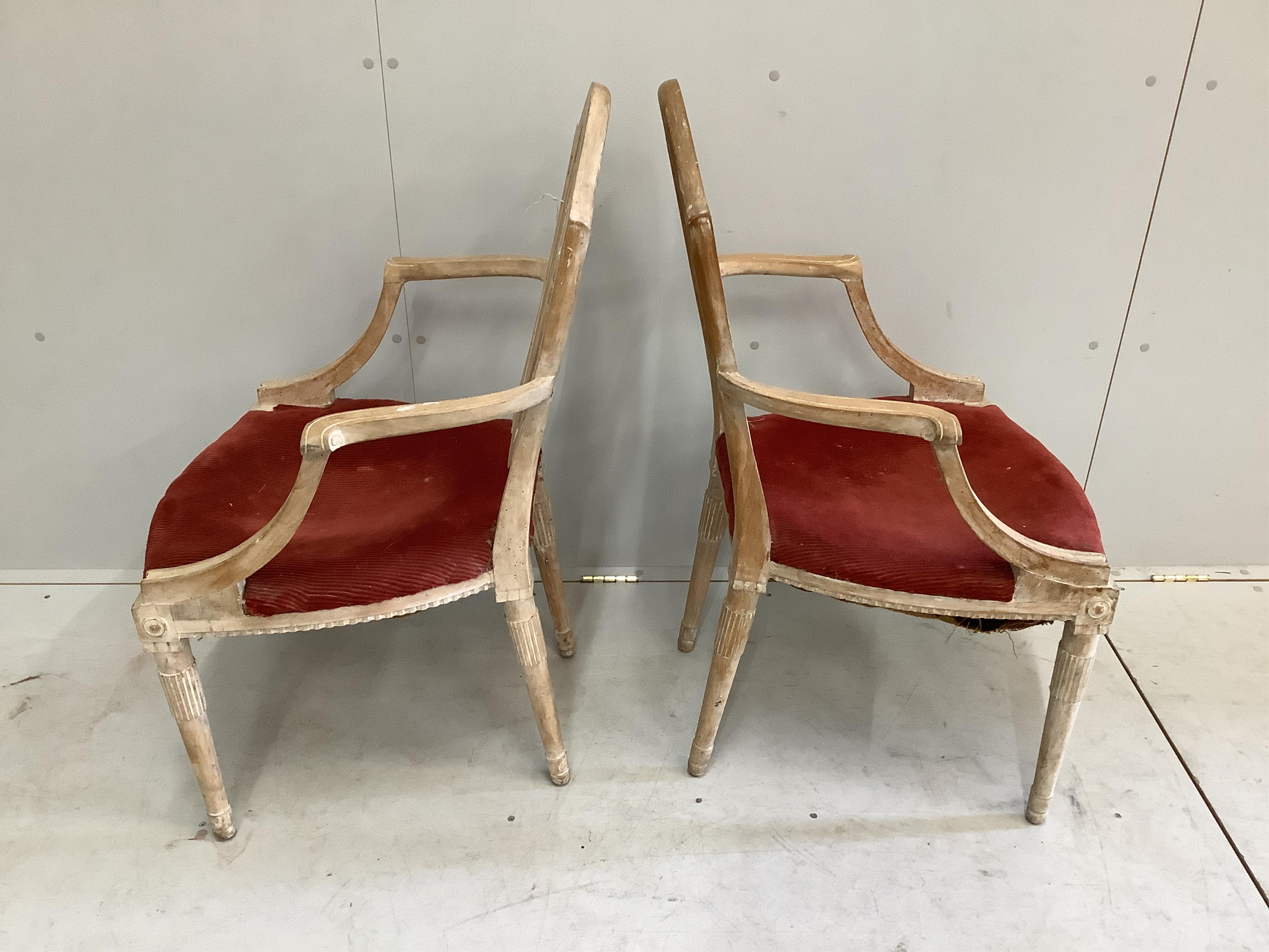 A pair of bleached mahogany Hepplewhite style elbow chairs, width 58cm, depth 49cm, height 86cm